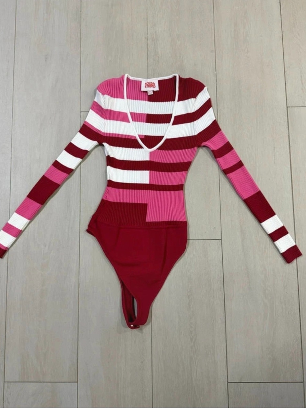 Solid & Striped Michelle
Red and Pink Bodysuit (size medium)